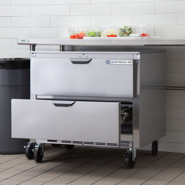 A Beverage-Air stainless steel undercounter refrigerator with two drawers.