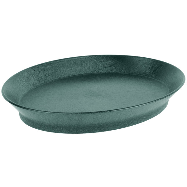 A black oval polypropylene deli server with a green rim on a table.