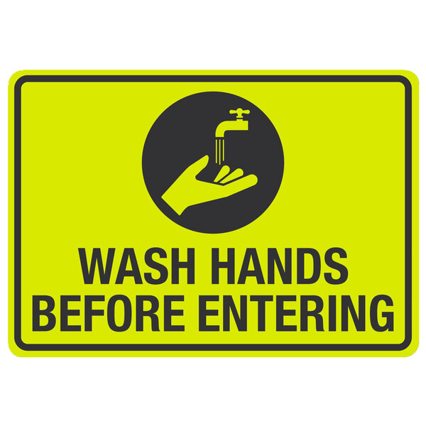 A yellow and black sign with the words "Wash Hands Before Entering" and a black and white image of a hand washing a faucet.