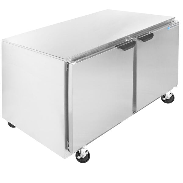 A large stainless steel Beverage-Air undercounter refrigerator and freezer with two doors on wheels.