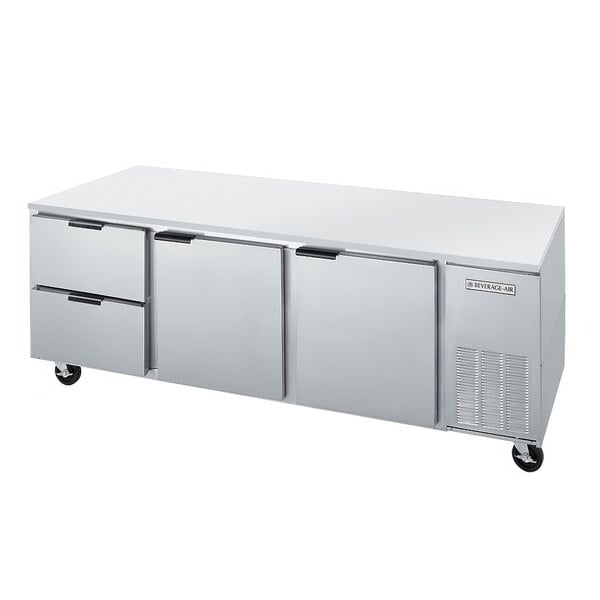 A stainless steel Beverage-Air undercounter refrigerator with four drawers.