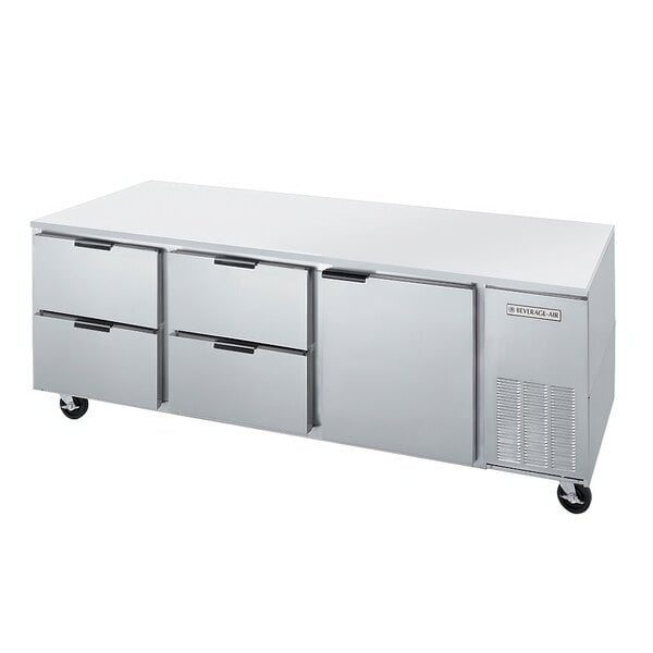 A stainless steel undercounter refrigerator with drawers.