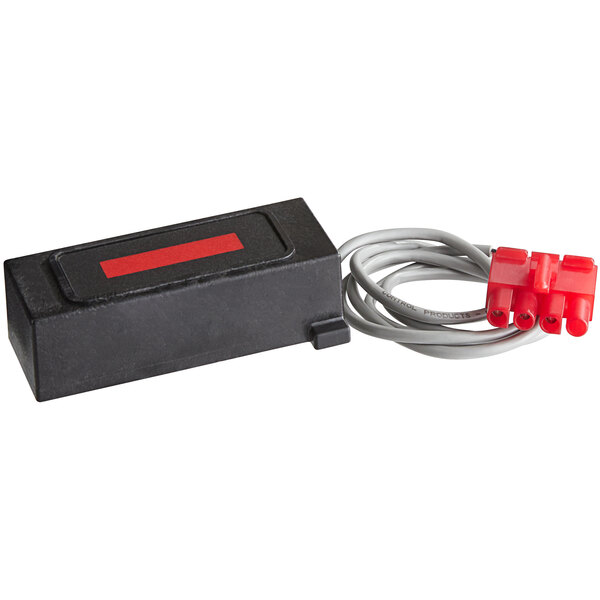A black rectangular sensor assembly with red and gray wires and a red label.