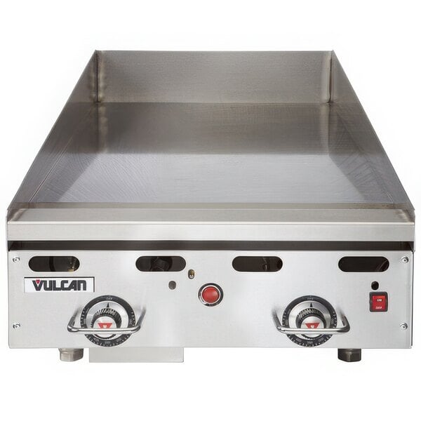 A Vulcan stainless steel commercial griddle with snap-action thermostatic controls.