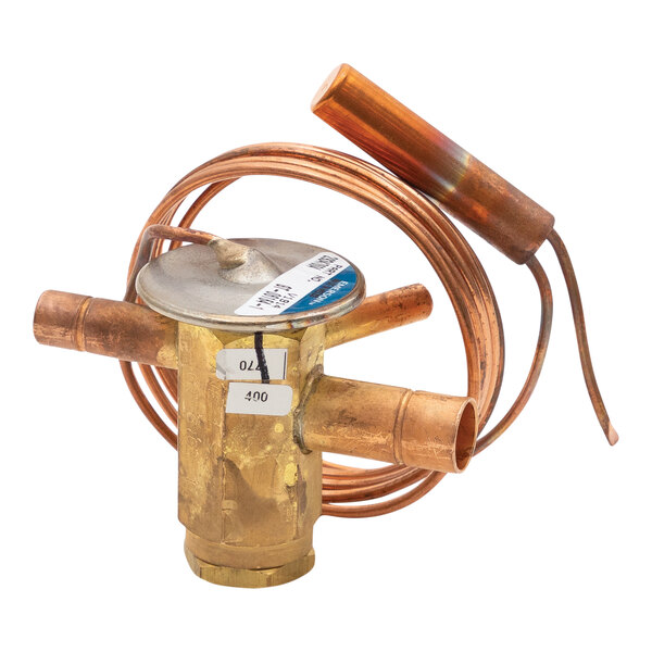 A Heatcraft TXV valve with a copper pipe attached.