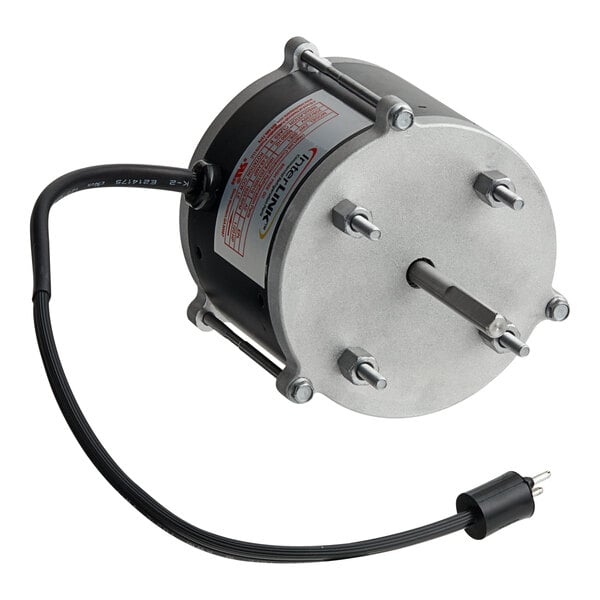 A round, small metal Heatcraft evaporator fan motor with a black wire.