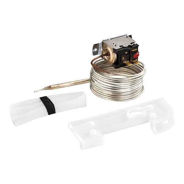 A Hoshizaki thermostat with a wire and plastic cover over a small device.