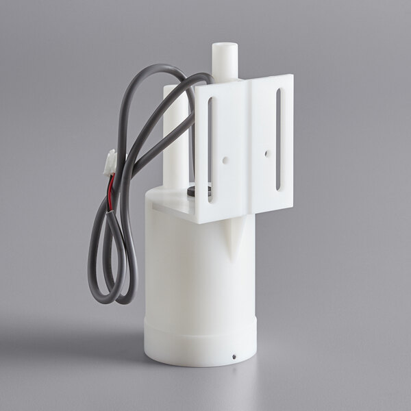 a white plastic pole with black wires