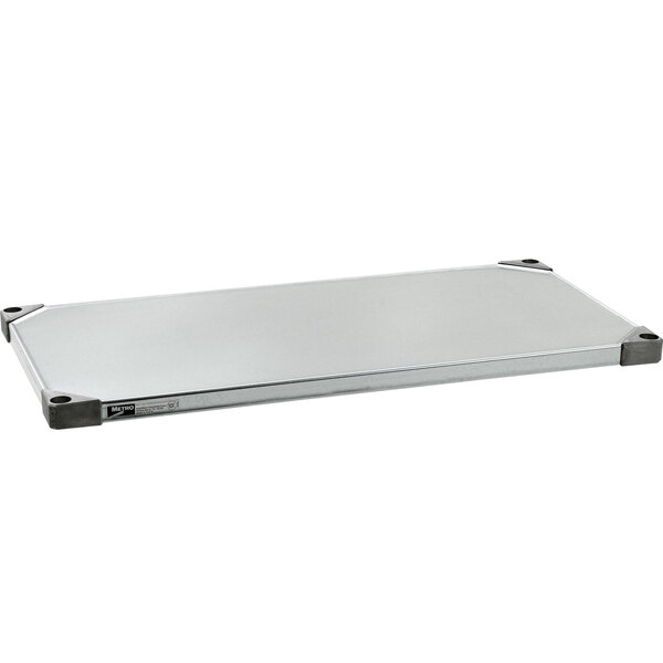 A silver rectangular Metro shelf.