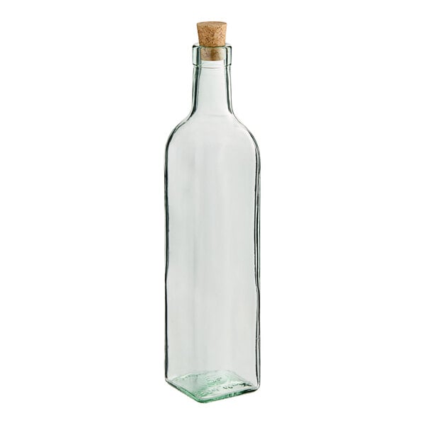 A clear glass Tablecraft oil and vinegar bottle with a cork stopper.