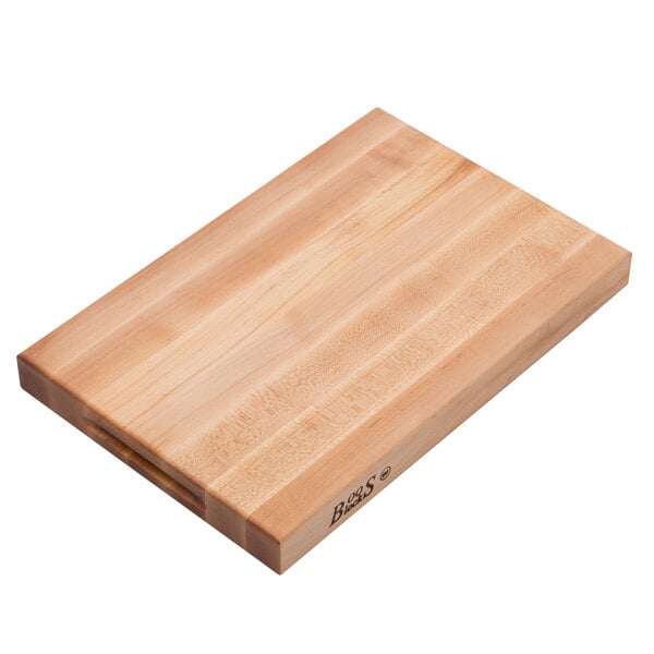 a wooden cutting board with a handle