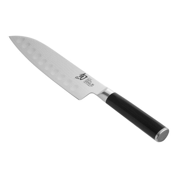 A 7-inch forged hollow ground Santoku knife with a pakkawood handle.