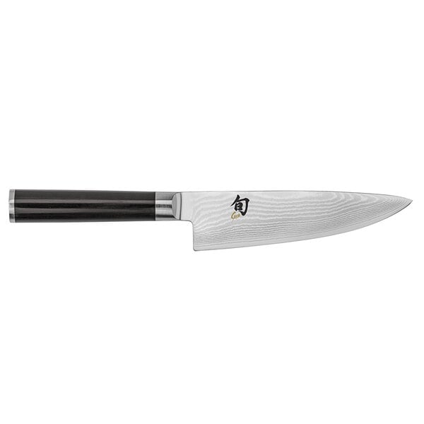 A Shun Classic chef knife with a black handle and silver blade.
