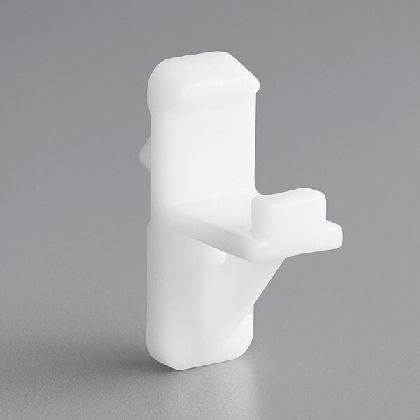 a white plastic holder for a device