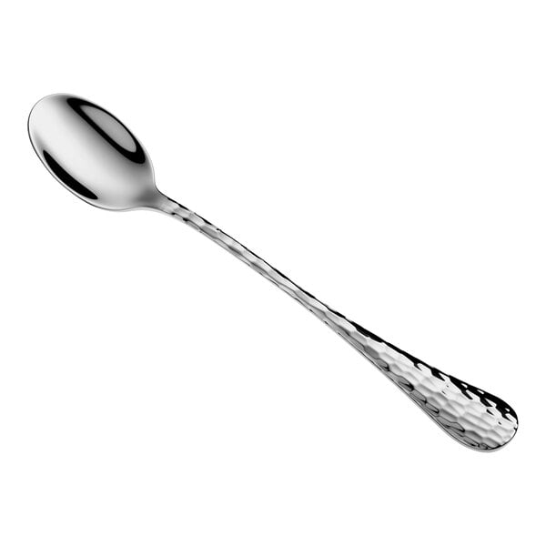 A long, shiny metal spoon with a hammered texture on the handle, photographed on a white background.