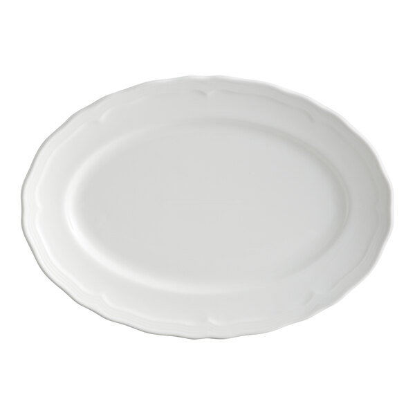 An oval pearl white porcelain platter with a scalloped wide rim.