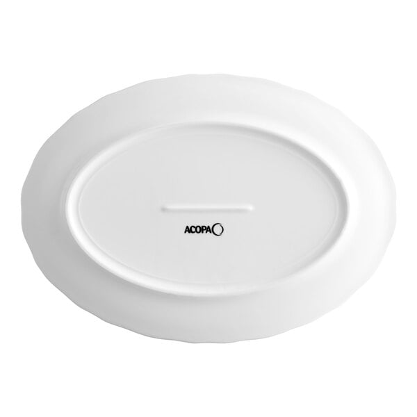 An oval white porcelain platter with a scalloped wide rim, shown from the bottom with the Acopa brand logo.