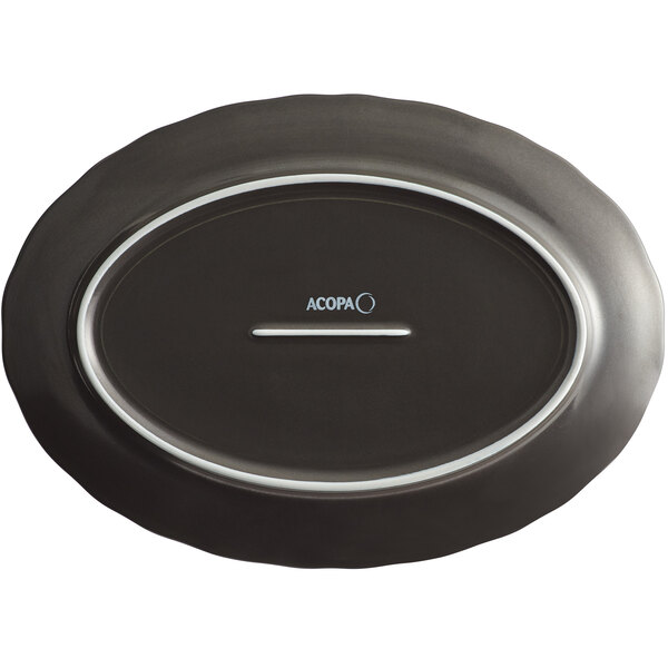 An Armor Gray oval porcelain platter with a white scalloped rim.