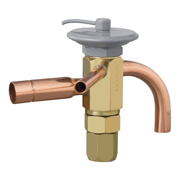 A close-up of a copper Heatcraft expansion valve.