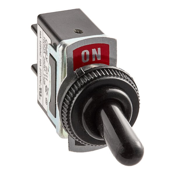 A close up of a black ServIt toggle switch with a red label.
