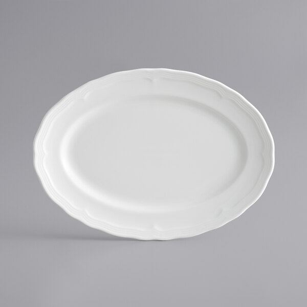 a white plate with a fork