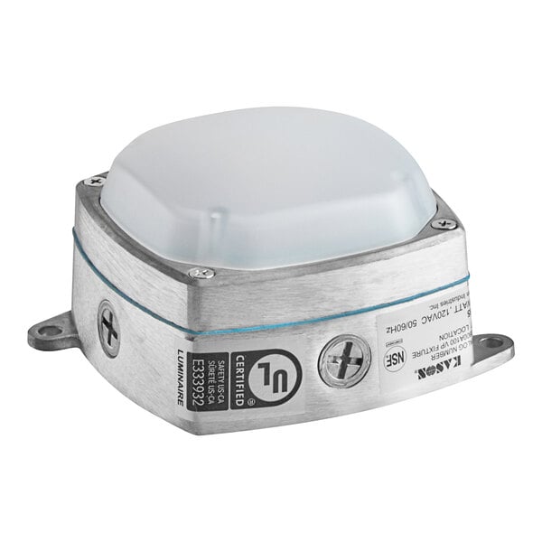 A close up of a Kason surface mount LED light fixture with a small white light.
