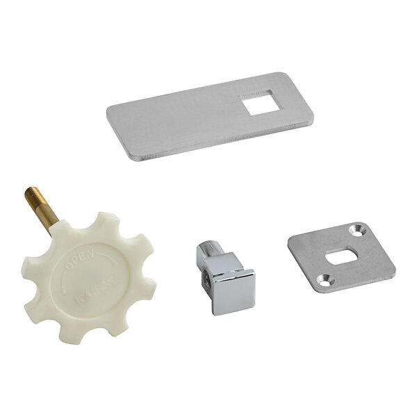 A group of metal parts including a silver rectangular hasp with holes and a white rectangular gear.