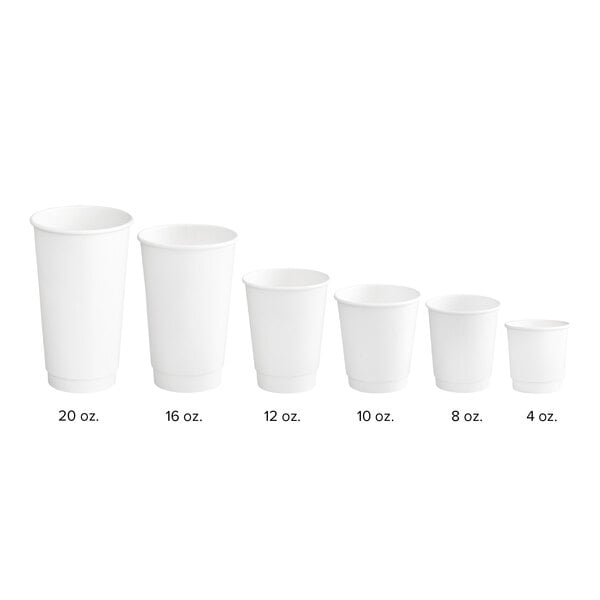 A row of Choice white double wall paper hot cups.