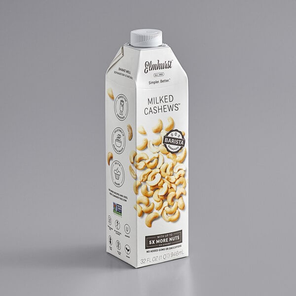 A carton of Elmhurst Milked Cashews with cashews on it.