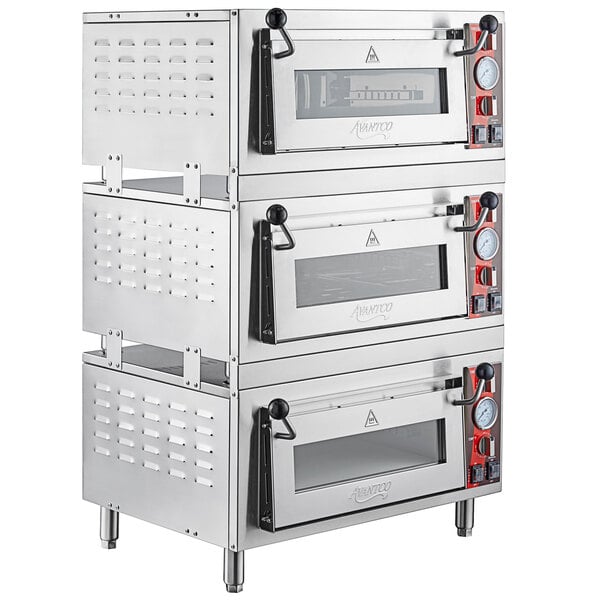 A stack of stainless steel Avantco countertop pizza ovens.