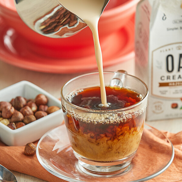 Elmhurst's Hazelnut Oat Creamer 16 oz. Container