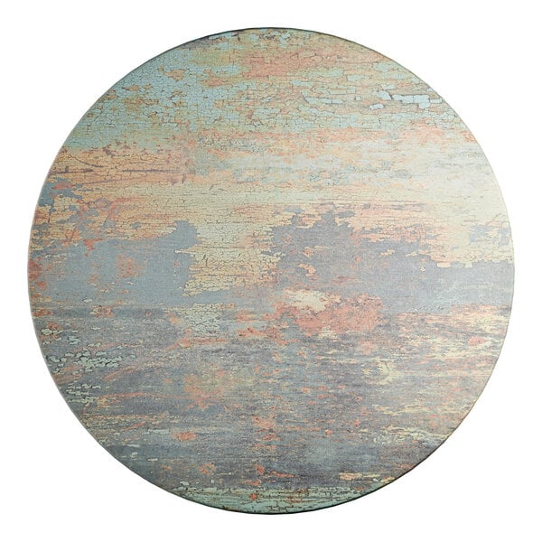 A 36-inch round table top with a textured canyon painted faux metal finish.