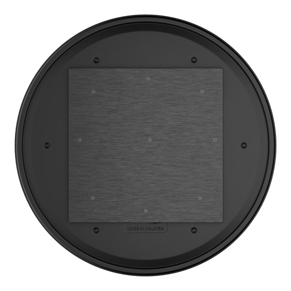 A round table top with a textured canyon painted faux metal finish and a central square mounting plate.