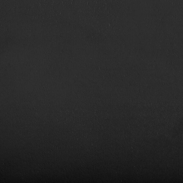 A black wood chair with a black wood seat and ladder back.