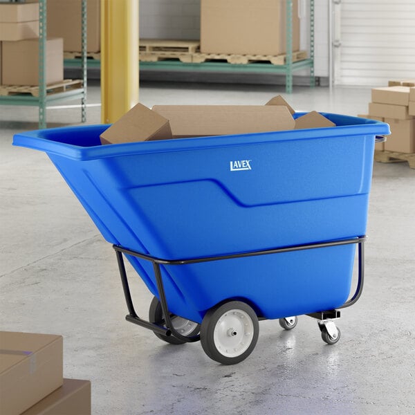 A blue heavy-duty tilt truck or trash cart with a 1 cubic yard capacity, designed for transporting materials in industrial or commercial settings.