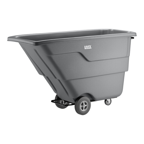 A large gray tilt truck or trash cart with wheels, designed for heavy-duty waste transport.