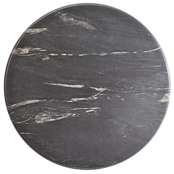 A Lancaster Table & Seating Excalibur black and white marbled table top.