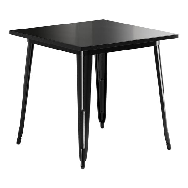 A Lancaster Table & Seating Onyx Black metal table with legs.