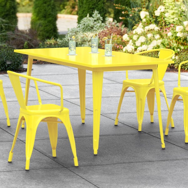 yellow metal garden table and chairs