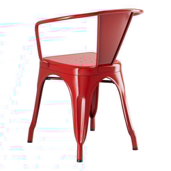A red Lancaster Table & Seating Alloy Series arm chair on a patio.
