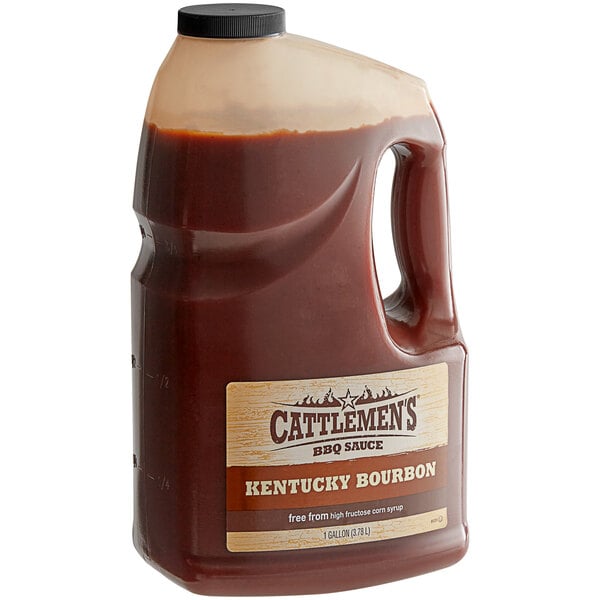 A jug of Cattlemen's Kentucky Bourbon BBQ Sauce on a table.