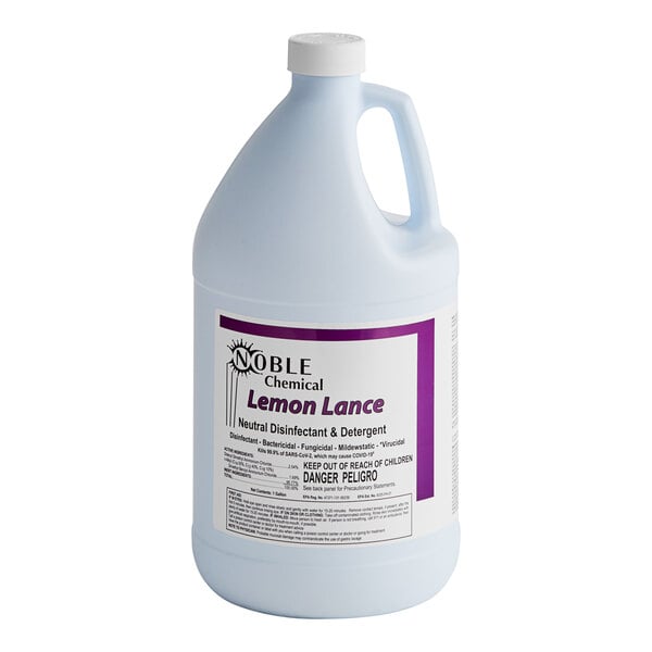 A white jug of Noble Chemical Lemon Lance Lemon Concentrated Disinfectant & Detergent Cleaner with a purple label.