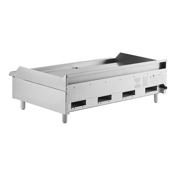 An Avantco stainless steel countertop gas griddle with thermostatic controls.