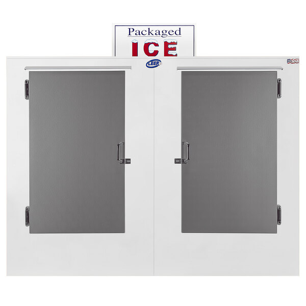 A white double door Leer ice merchandiser with a sign reading "Packaged Ice" above.