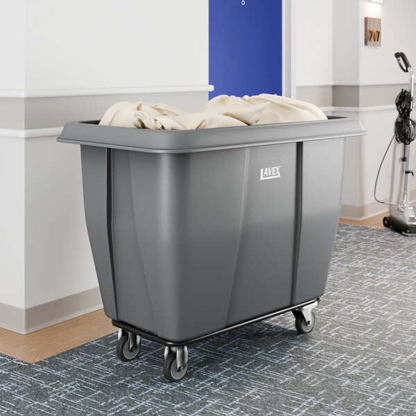 A large gray Lavex cube truck with a 12 cubic foot capacity, designed for transporting items such as linens, shown in a hallway.