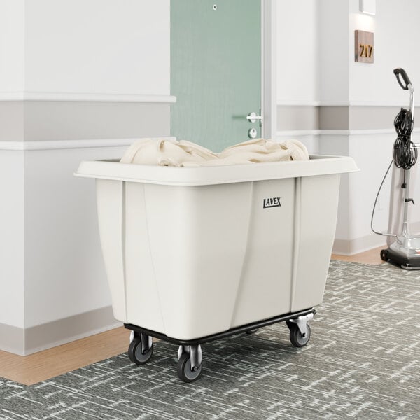 A white Lavex 8 cubic foot cube truck with a 500 lb. capacity, used for transporting items such as laundry or supplies.