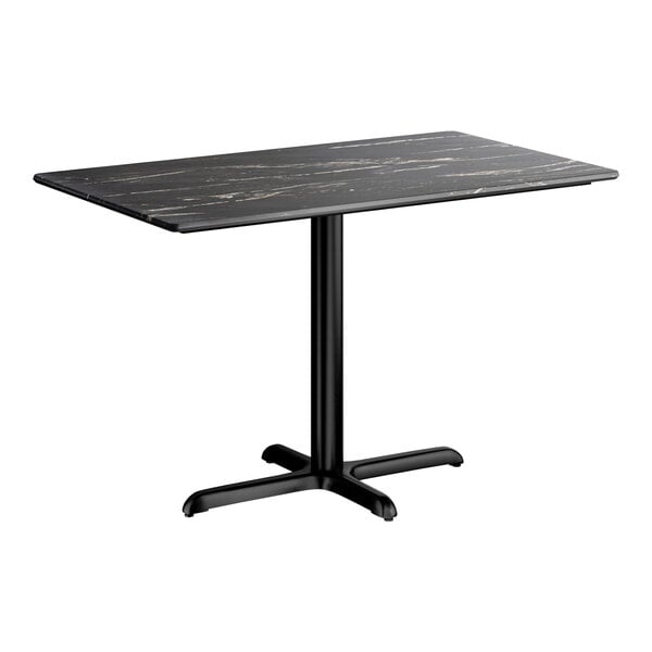 A rectangular standard height table with a smooth black finish and a cross base plate.