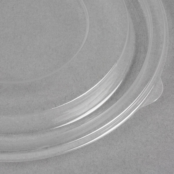 A clear plastic Sabert lid on a clear plastic container.