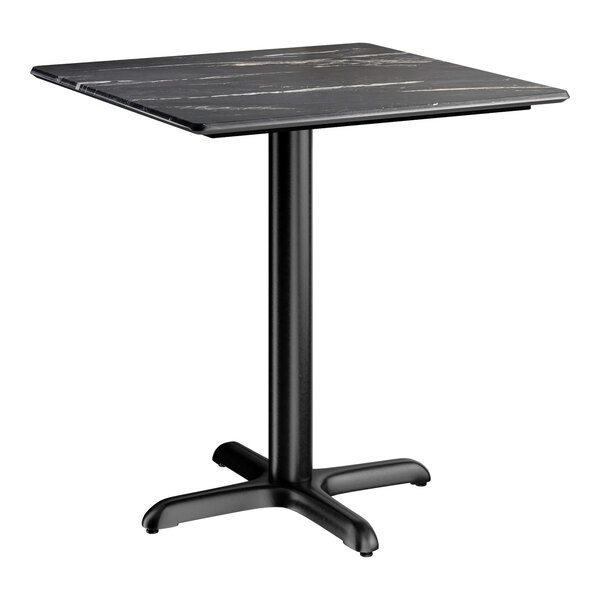 A square standard height table with a smooth black finish and a cross base plate.