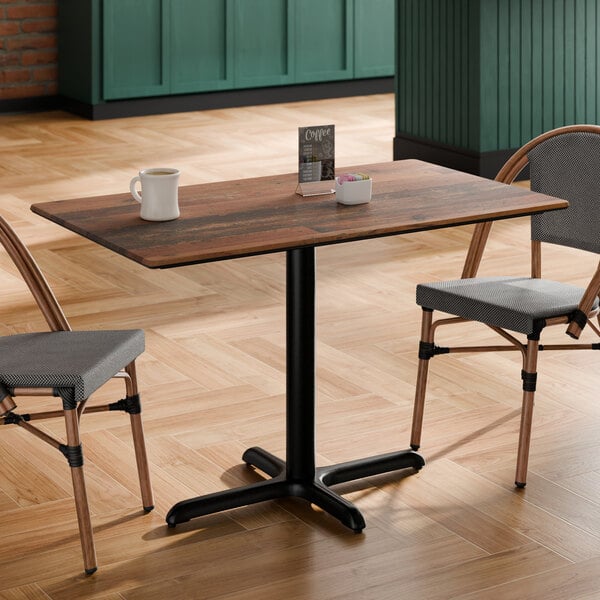 Lancaster Table & Seating Excalibur 28" x 48" Rectangular Standard Height Table with Textured Farmhouse Finish and Cross Base Plate